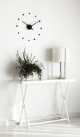 Designové nástěnné hodiny NOMON OJ černé 50cm