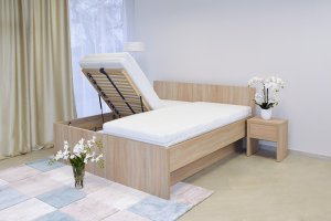Moderní postel s plným čelem Tropea